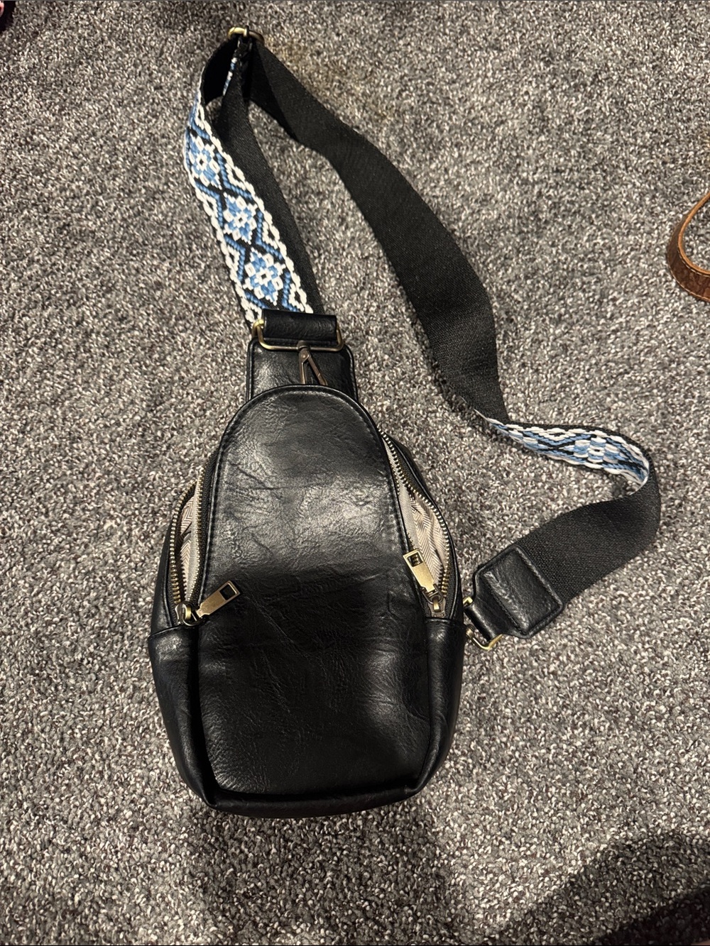 Black Leather Crossbody Sling Bag with Patterned Strap